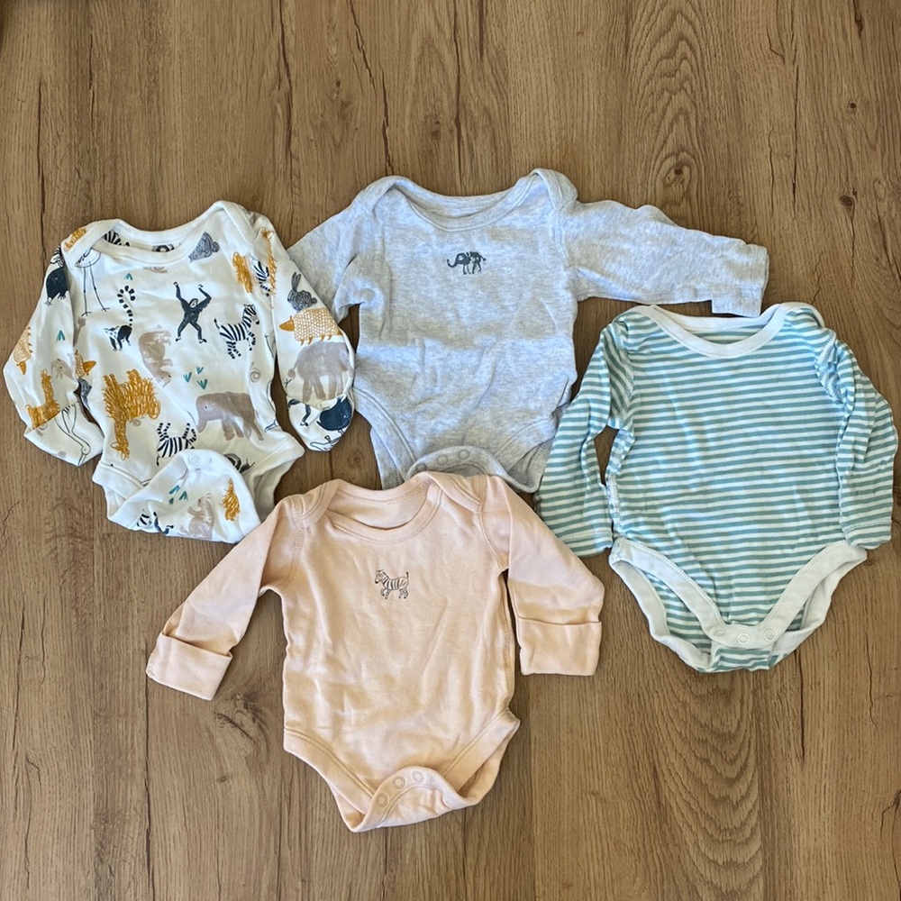 Four matching baby onesie